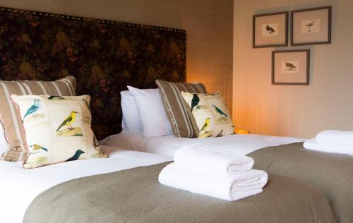 Cama o camas de una habitación en George III Hotel
