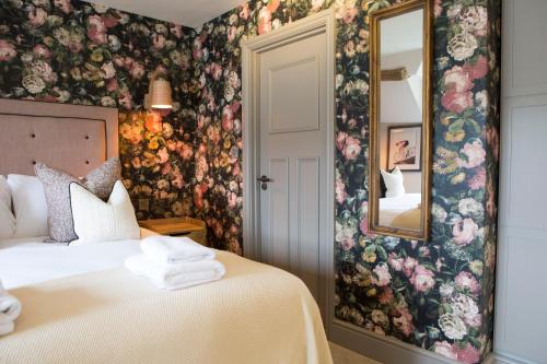 Cama o camas de una habitación en George III Hotel
