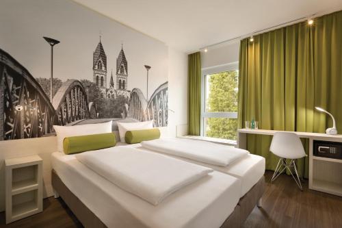 Postelja oz. postelje v sobi nastanitve Super 8 by Wyndham Hamburg Mitte