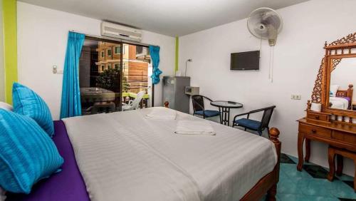 Televisyen dan/atau pusat hiburan di Nong Guest House