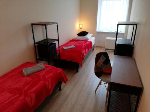 Posteľ alebo postele v izbe v ubytovaní Apartament Miarki