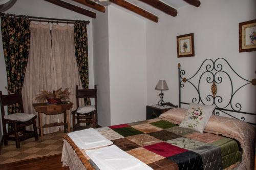 Postel nebo postele na pokoji v ubytování Casa Rural del Puerto de San Vicente