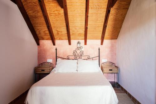 A bed or beds in a room at Casa Lola