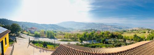 a view of a valley with mountains in the background at Villa Aurora in Villanova del Battista