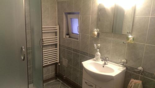 Ванная комната в Casa Piatra Craiului