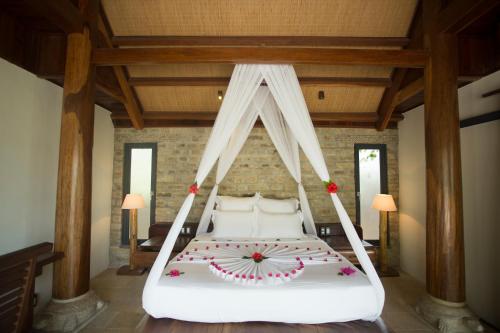 Ένα ή περισσότερα κρεβάτια σε δωμάτιο στο The Trang Villas