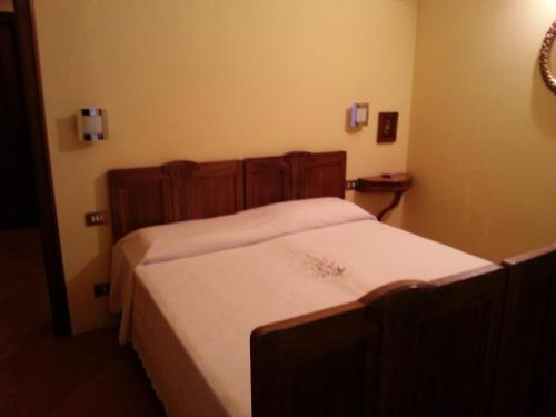 Postel nebo postele na pokoji v ubytování Gli Aceri B&B