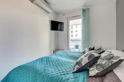 Postel nebo postele na pokoji v ubytování Platinium Spectrum Apartment
