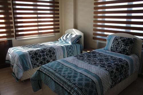 Postel nebo postele na pokoji v ubytování Rahal Kalkınma Apart