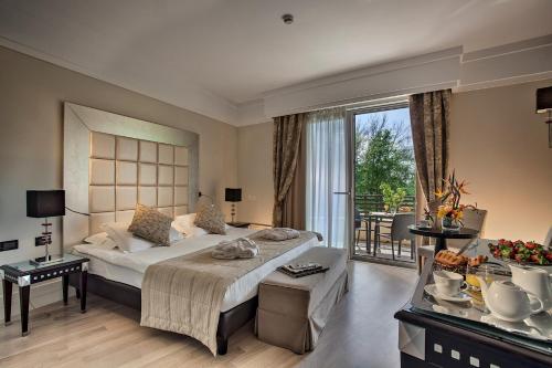 Posteľ alebo postele v izbe v ubytovaní Park Hotel Junior