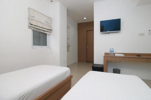 Cama o camas de una habitación en Residence100