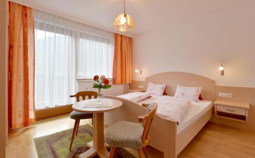 Posteľ alebo postele v izbe v ubytovaní Haus Dejakom Mayrhofen