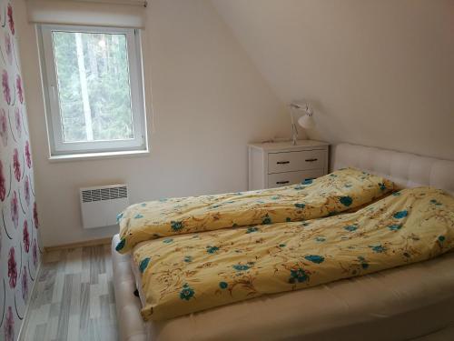 Postel nebo postele na pokoji v ubytování Nature,sandy beach nearby,hot tube,3 km from Pärnu