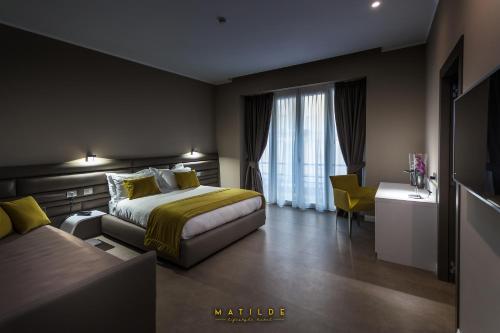 Postel nebo postele na pokoji v ubytování Hotel Matilde - Lifestyle Hotel