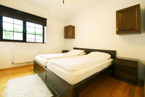 מיטה או מיטות בחדר ב-Domeniul Roa