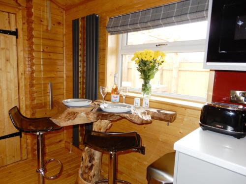Kuchyň nebo kuchyňský kout v ubytování Balmoral Studio Lodge