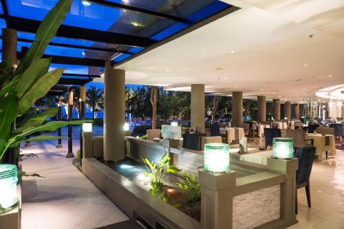 a view of the restaurant at the resort at Royal Wing Suites & Spa Pattaya in Pattaya South
