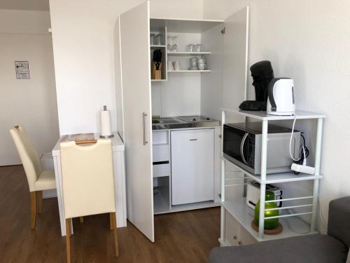 Dapur atau dapur kecil di Fewo und Meer WHV