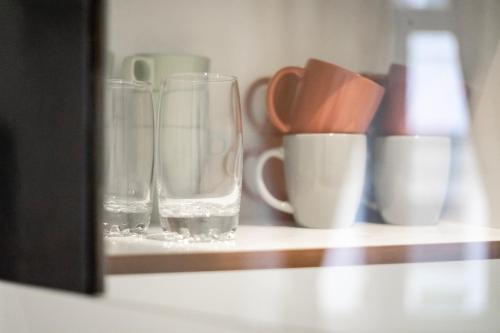 Příslušenství pro přípravu čaje a kávy v ubytování Vienna City Apartments Brigittenau
