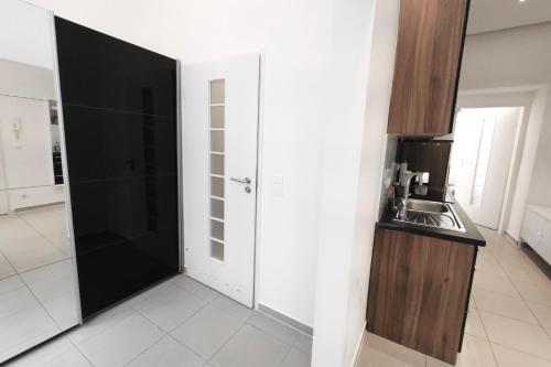 Kuchyň nebo kuchyňský kout v ubytování Vienna City Apartments Brigittenau