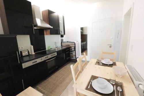 Kuchyň nebo kuchyňský kout v ubytování Vienna City Apartments Brigittenau