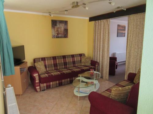 Χώρος καθιστικού στο Ferienwohnung Rogge (Stendal)