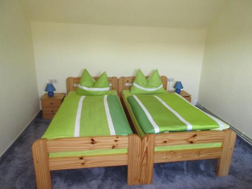Llit o llits en una habitació de Ferienwohnung Rogge (Stendal)