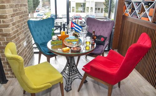 a table and chairs sitting on a patio at Hotel Del Medio in Sutomore