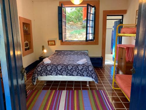 Postel nebo postele na pokoji v ubytování El Palacio