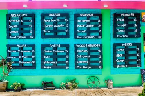 a scoreboard on the side of a building at The Upcycled Hostel Huacachina in Ica