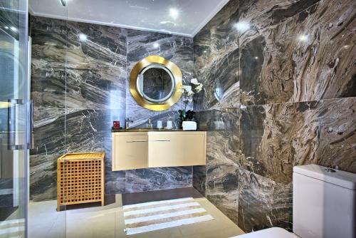 a bathroom with a sink and a mirror at MyPlace Lisbon - Areeiro in Lisbon