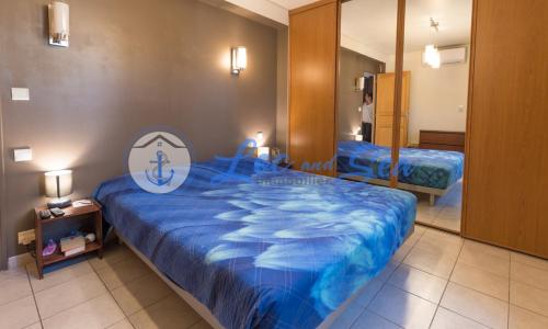 Ein Bett oder Betten in einem Zimmer der Unterkunft Maison Flamants Roses avec Piscine