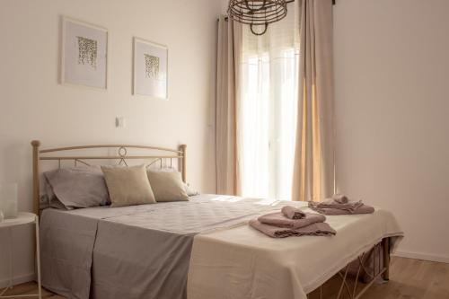Ένα ή περισσότερα κρεβάτια σε δωμάτιο στο Ayerina semi-detached Villas