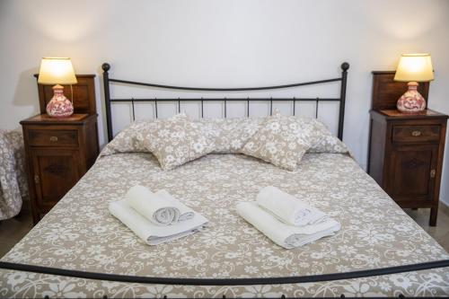Ένα ή περισσότερα κρεβάτια σε δωμάτιο στο Casa Camelia