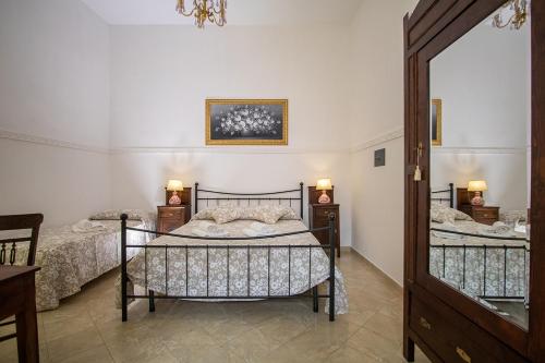 Кровать или кровати в номере Casa Camelia