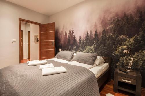 Posteľ alebo postele v izbe v ubytovaní ApartSerwis - Apartament Zacisze