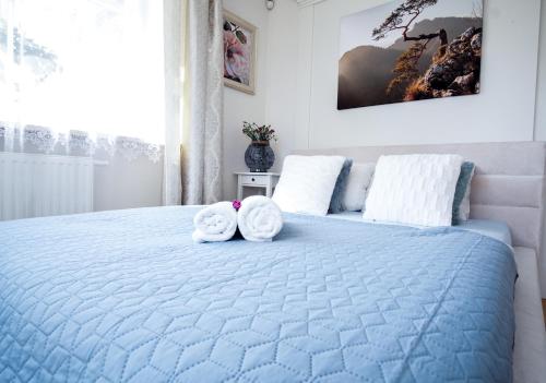 Cama o camas de una habitación en roomsy guest house