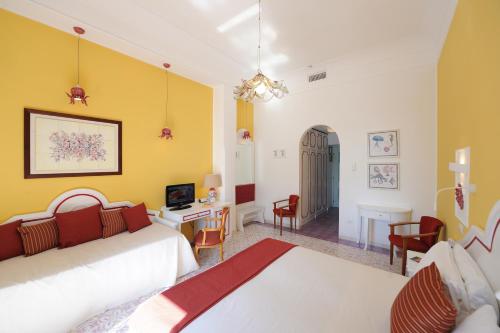 Ένα ή περισσότερα κρεβάτια σε δωμάτιο στο Hotel La Bussola