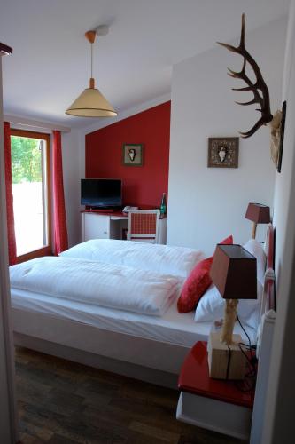 Una cama o camas en una habitación de Hotel Gamshof