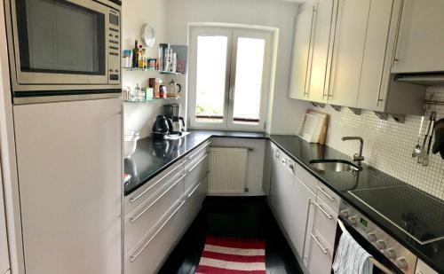 Una cocina o cocineta en Ferienhaus am See