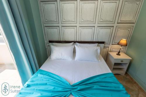 Ένα ή περισσότερα κρεβάτια σε δωμάτιο στο Irene Suites