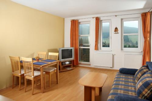 Posezení v ubytování Apartmány KLÍNOVEC - Apartment KEILBERG