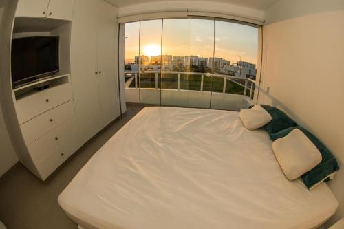 A bed or beds in a room at Casa en Nuevo Paracas