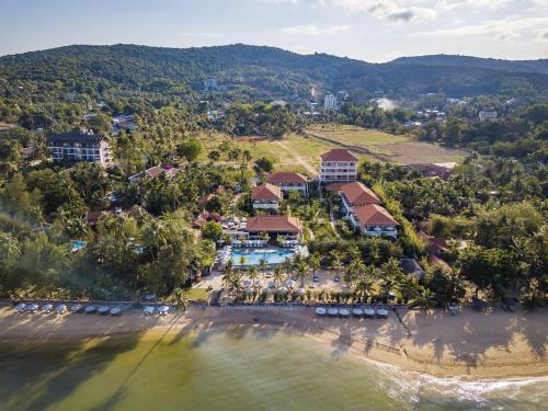 an aerial view of a resort on the beach at Cassia Cottage in Phú Quốc