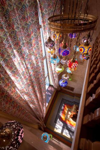 an overhead view of a room with a window with lights at Navat Hotel in Bishkek