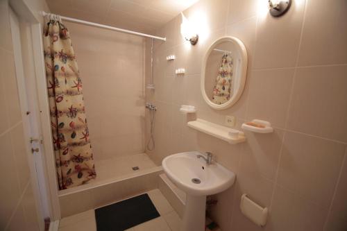 Koupelna v ubytování Guest House Kamenny Dom