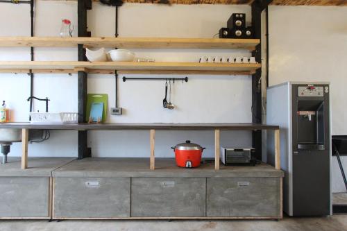 Una cocina o zona de cocina en Grass Villa