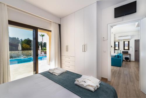 Postel nebo postele na pokoji v ubytování Platanias Villa Mirsini