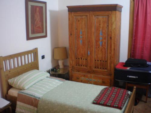 Ένα ή περισσότερα κρεβάτια σε δωμάτιο στο Bed & Breakfast Il Giardino