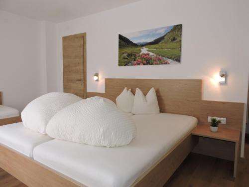 Postel nebo postele na pokoji v ubytování Apart Antonius